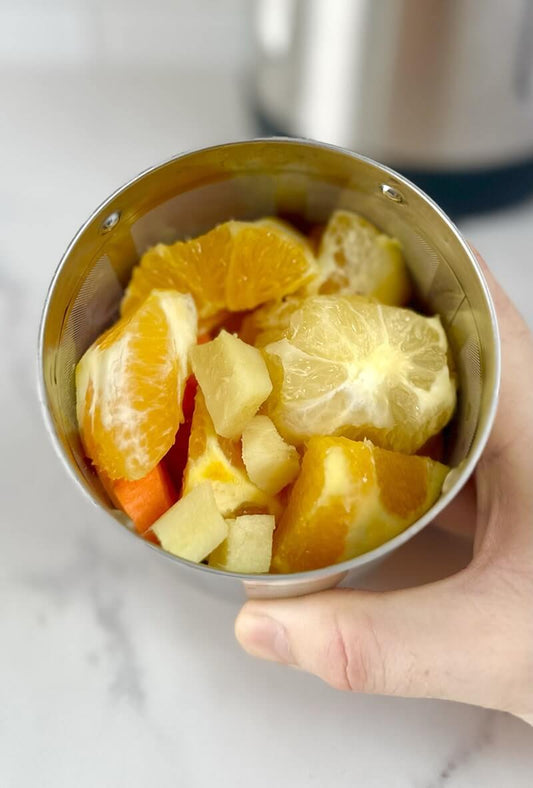 Fresh vitamin water made with oranges, lemon, carrot, and ginger